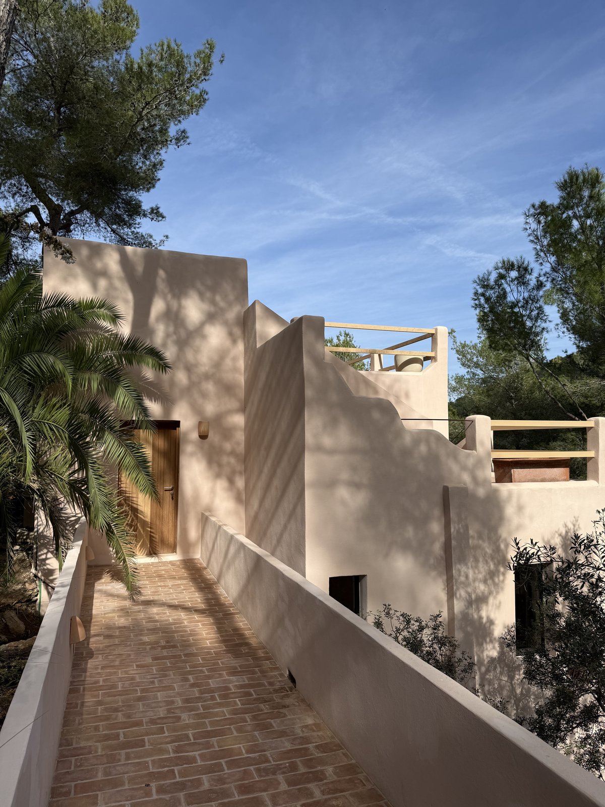 Can Opy exterior, cream plaster house on the east coast of Ibiza